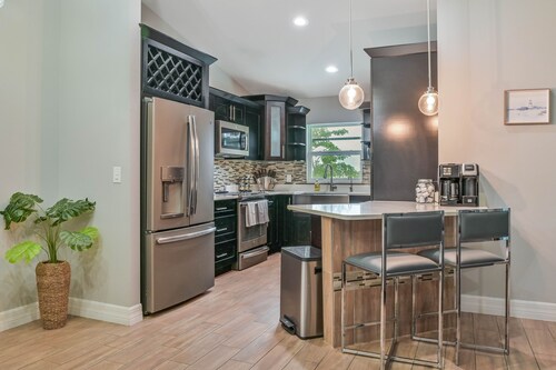 Modern Coastal 3 Bedroom Villa with Salt Water Heated Pool & Office!