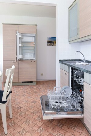 Fridge, oven, dishwasher, high chair