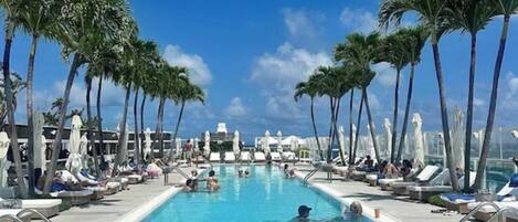 Outdoor pool, a heated pool, pool loungers