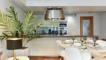 Superior Apartment | Private kitchen | Full-sized fridge, microwave, oven, stovetop