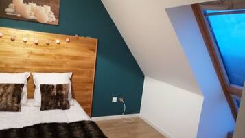 2 dormitorios, tabla de planchar con plancha, wifi gratis y ropa de cama