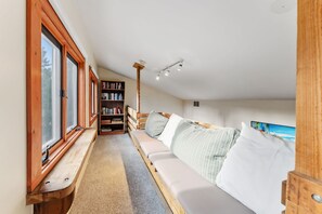 TV, fireplace, books, offices