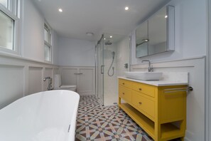 Bañera, secador de pelo