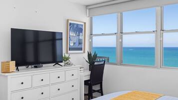 1 bedroom, desk, iron/ironing board, travel crib
