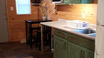 Fridge, microwave, coffee/tea maker, toaster