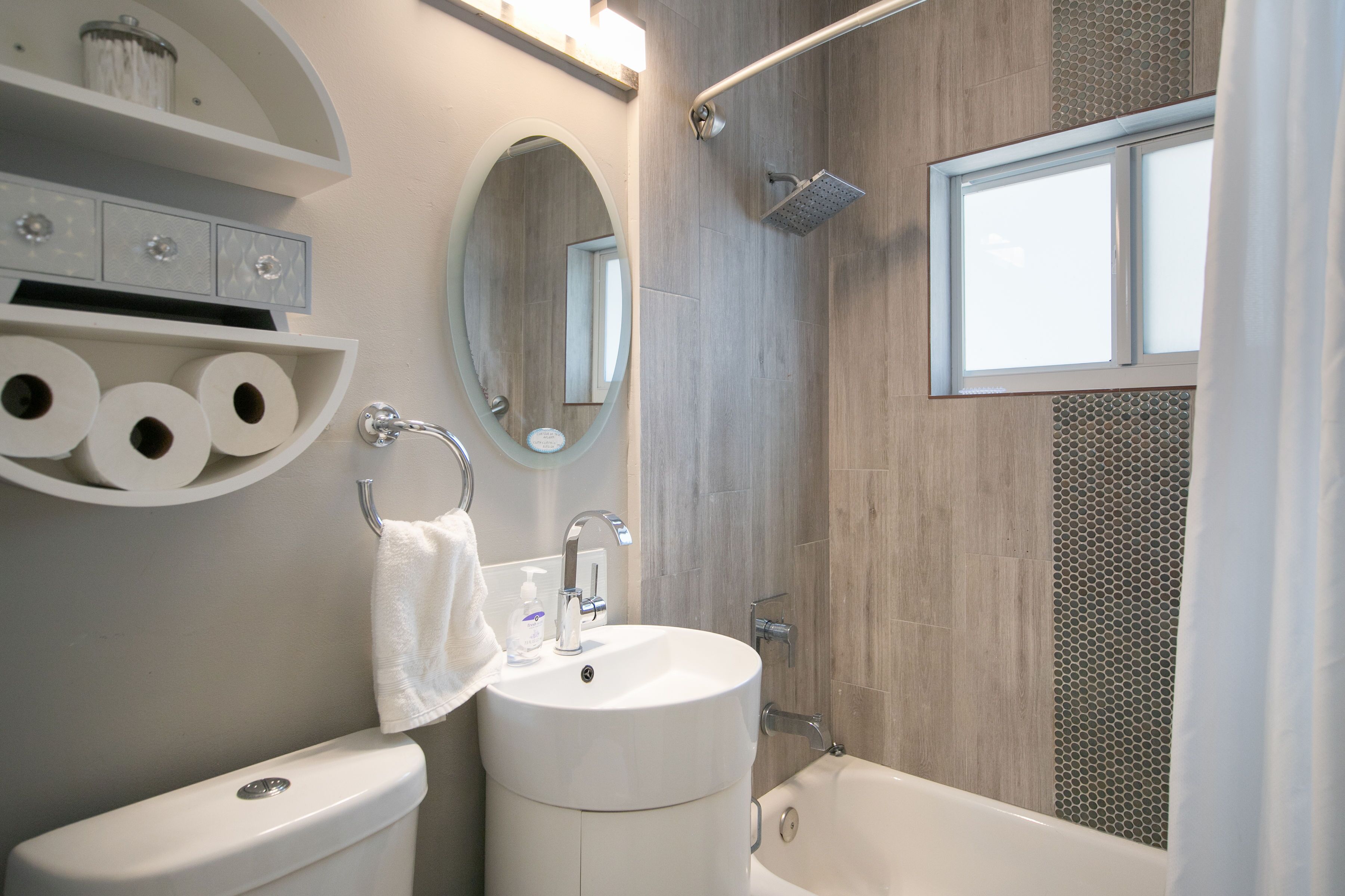 Combined shower/tub, hair dryer, towels, soap