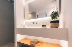 Essence Room with Garden View | Bathroom | Shower, rainfall showerhead, designer toiletries, hair dryer