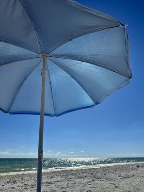 On the beach, sun-loungers, beach towels