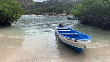 On the beach, sun loungers