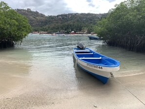 On the beach, sun-loungers