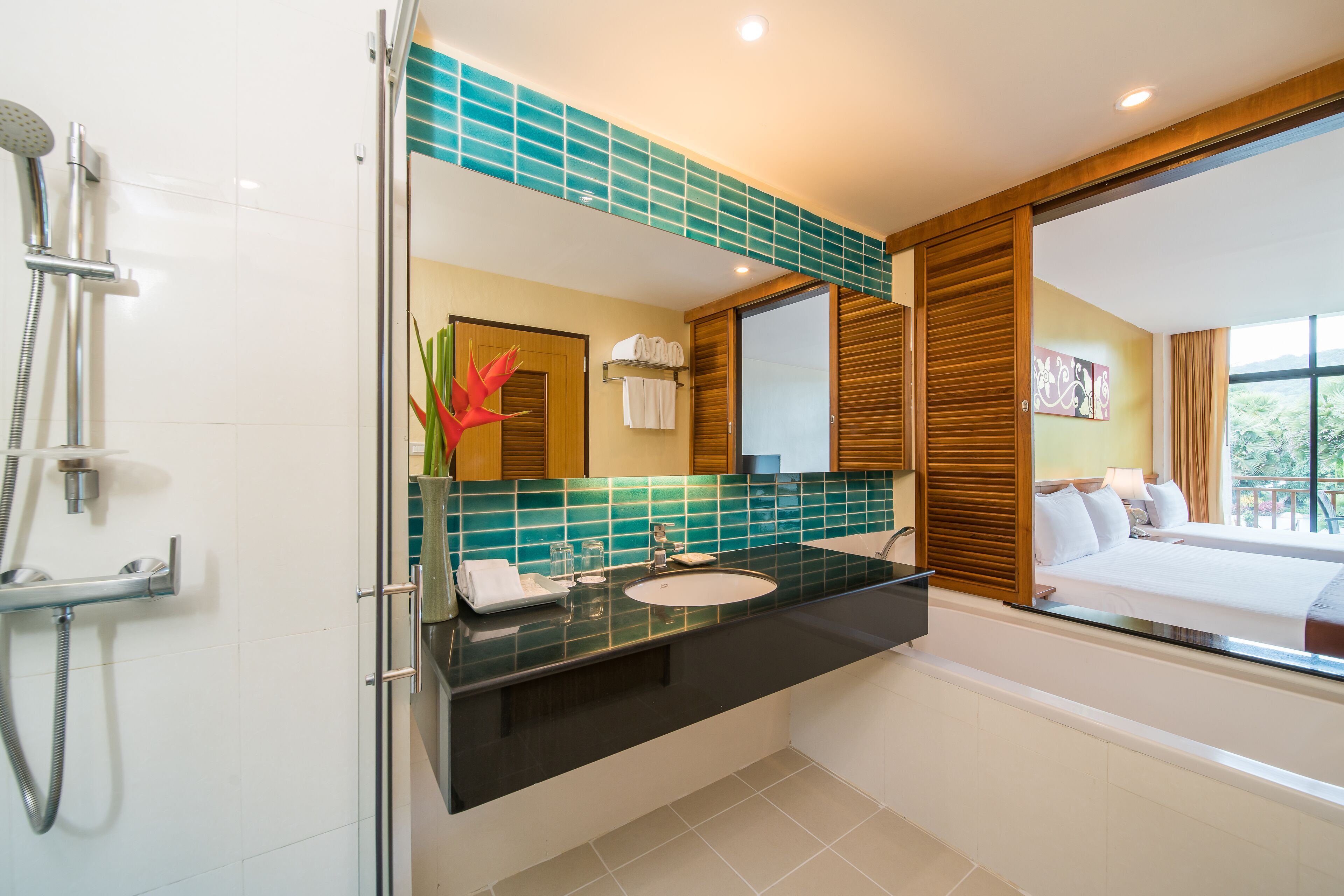 deluxe triple room, pool view (family) | bathroom | separate bathtub and shower, free toiletries, hair dryer, bathrobes