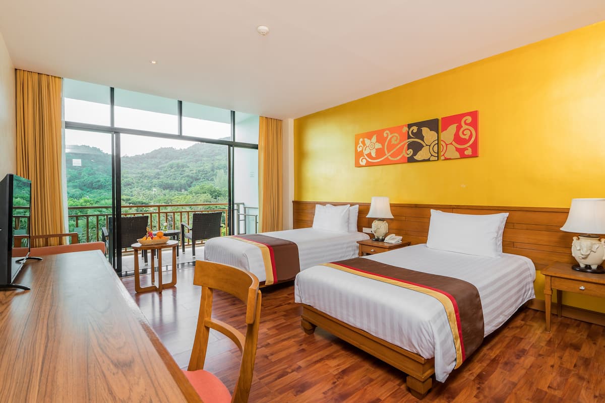 deluxe room, pool view | 1 bedroom, in-room safe, desk, blackout curtains