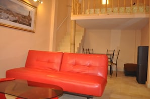 Apartemen, 1 kamar tidur | Area keluarga | TV