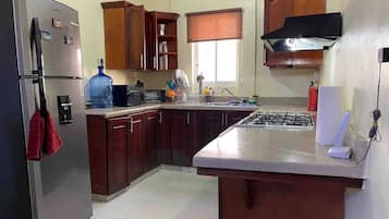 Apartment, 1 Bedroom | Private kitchen | Coffee/tea maker