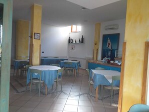 Room, 1 Bedroom, Accessible, Smoking | Dining room - Room-spacious Double Room Right by the s (Pineto)