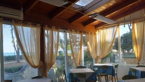 Room, 1 Bedroom, Accessible, Smoking | Dining room - Room-spacious Double Room Beside the sea (Pineto)