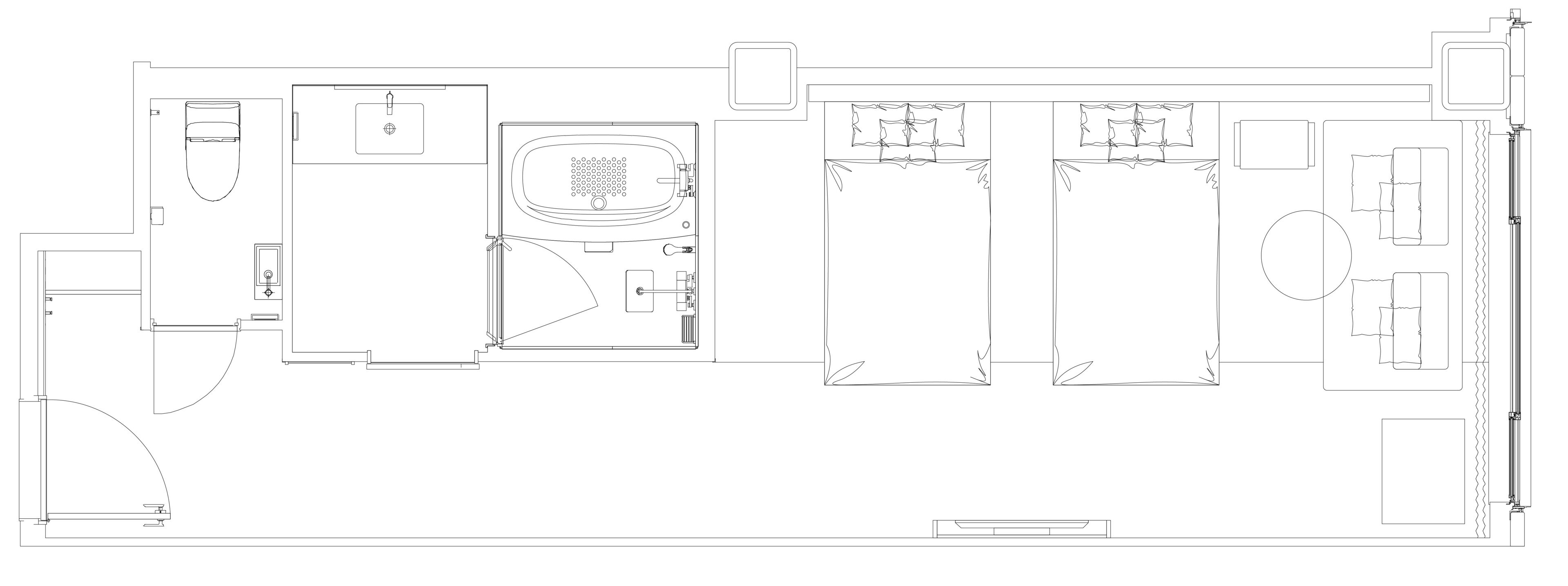 A floor plan of a hotel with a bathroom, a kitchen, and a seating area.