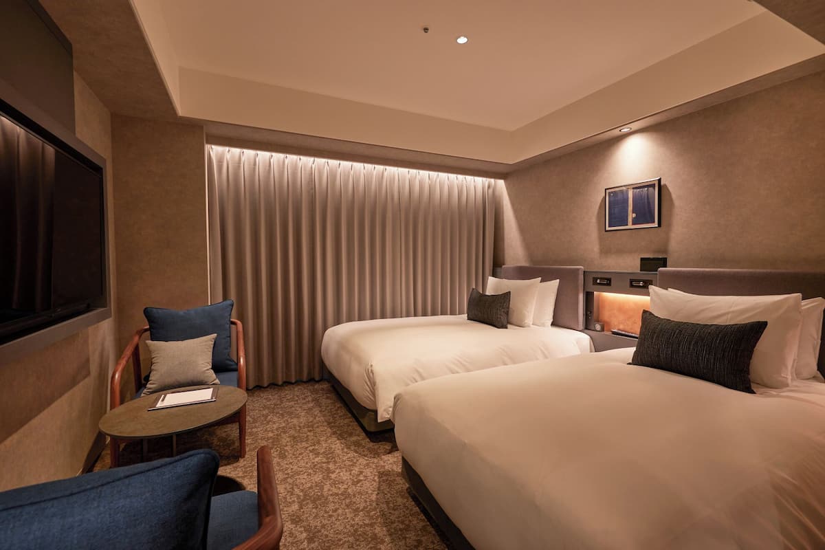 Chambre Économique avec lits jumeaux, rez-de-chaussée | Couette en duvet d'oie, coffres-forts dans les chambres