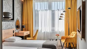 Hypo-allergenic bedding, in-room safe, desk, laptop workspace