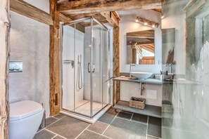 Bathtub, hair dryer, towels