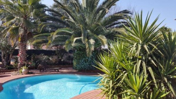 Deluxe Double Room | Pool | Outdoor pool - SleepEezy Cottages (Benoni)
