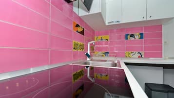 Villa | Private kitchen | Fridge, microwave, oven, stovetop