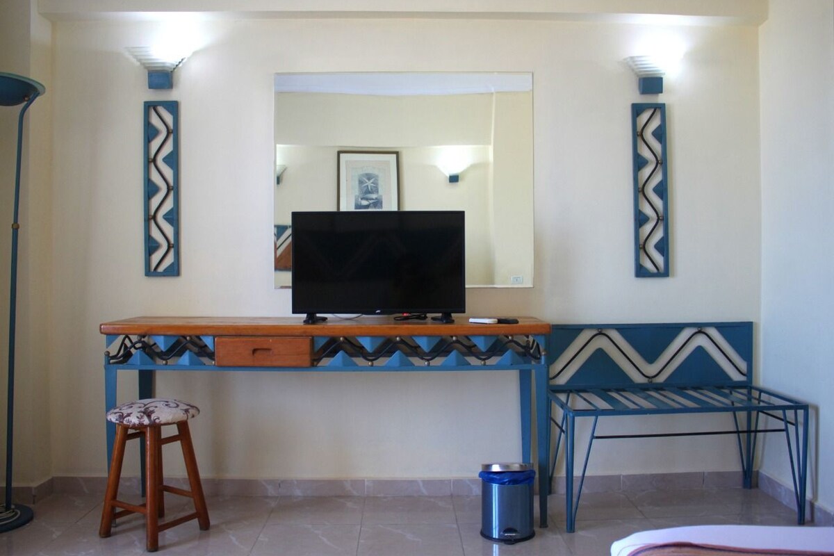 Minibar, blackout curtains, bed sheets