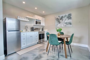 Fridge, microwave, stovetop, coffee/tea maker