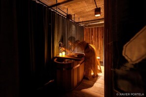 Sauna, massatges amb pedres calentes i massatges de teixits profunds 