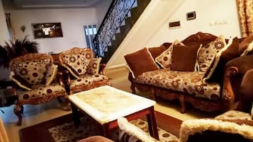 Standard Duplex | Living area | 42-inch flat-screen TV with satellite channels, TV