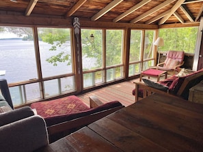 Fireplace, books - A Cottage on a Private Island Big Rideau Lake (Perth)