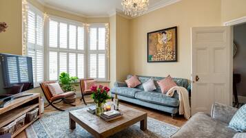 Smart TV, fireplace, video-game console, foosball