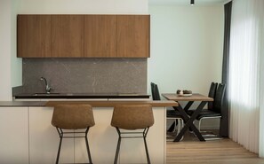 Family Apartment | Private kitchen | Fridge, electric kettle, dining tables - Lux Apartments (Pristina)