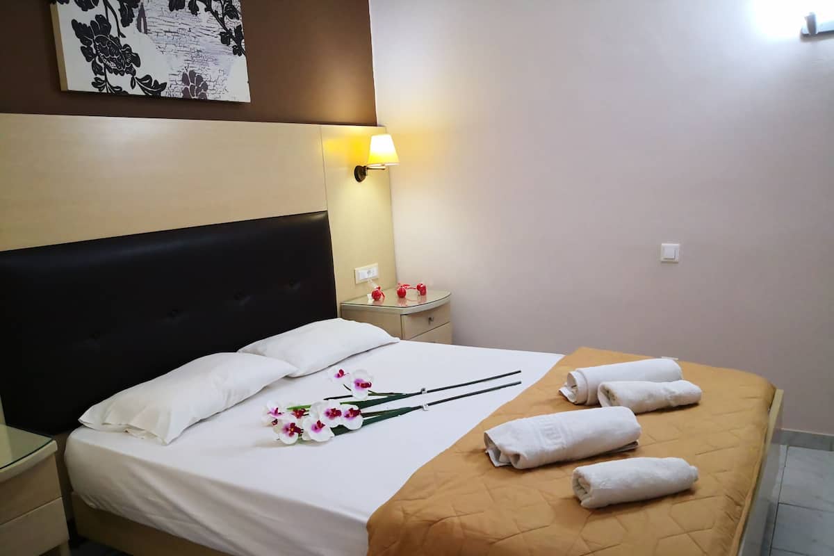 Comfort Quadruple Room | In-room safe, free WiFi, bed sheets