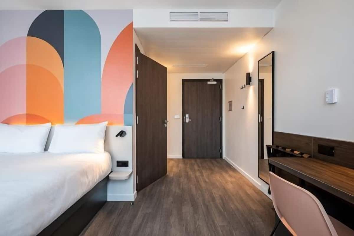 Desk, blackout drapes, soundproofing, iron/ironing board