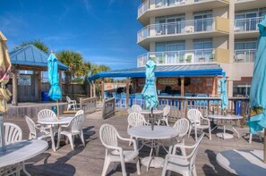 Outdoor dining - Bay Watch 1211-2BR/2BA Oceanfront Condo in North Myrtle Beach (North Myrtle Beach)