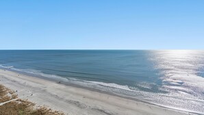 A beach with a clear sky and calm sea. - Bay Watch 1720-1BR/1BA Oceanfront Condo in North Myrtle Beach (North Myrtle Beach)