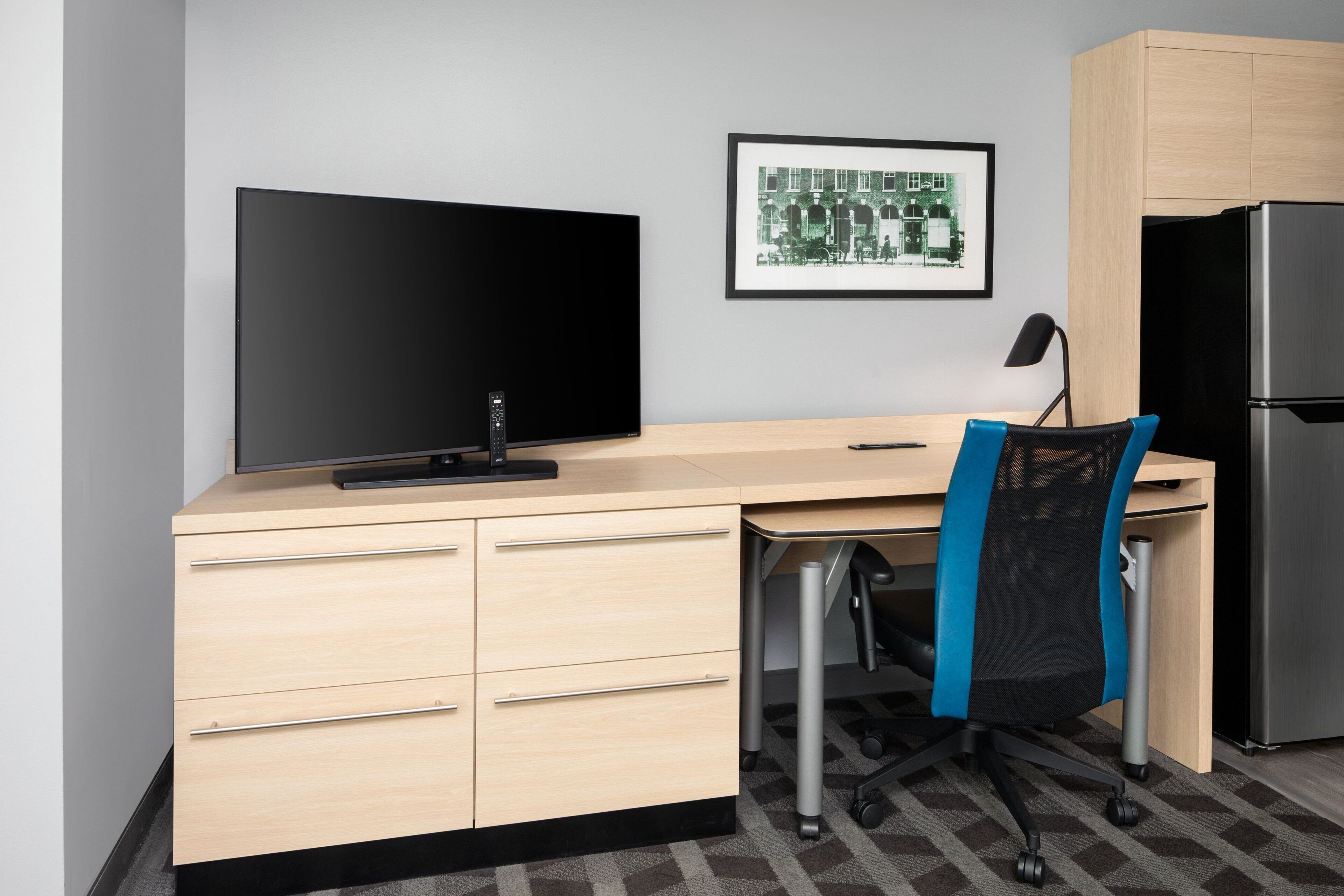 premium bedding, pillow-top beds, laptop workspace, blackout curtains