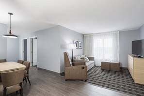 Premium bedding, pillowtop beds, laptop workspace, blackout drapes