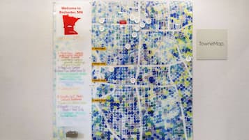 A map of Rochester, MN, with a welcome sign and a list of local attractions.