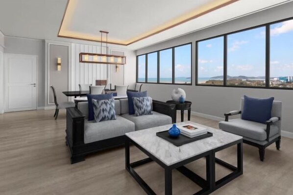 A modern living room with a sofa, armchairs, a coffee table, and a dining area with a table and chairs.