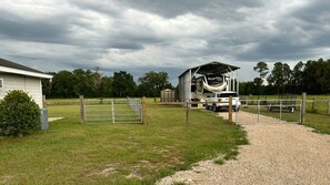 Property grounds - 6+ Sleeper Farm Escape with HUGE Yard and RV Hookup is Out Standing in its Field (Lake Butler)