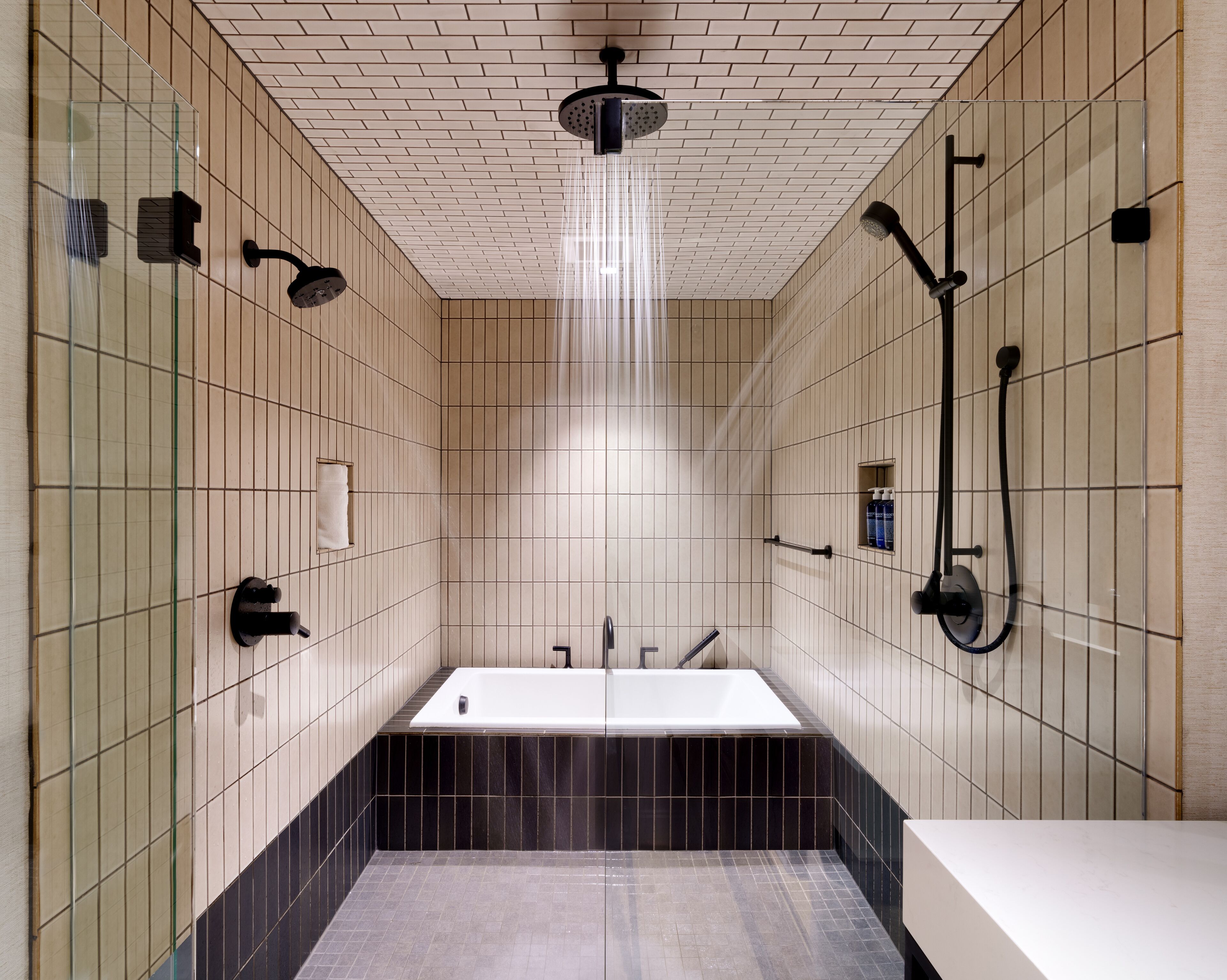 signature suite | bathroom | shower, eco-friendly toiletries, towels