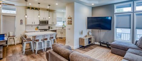 Smart TV, chimenea, reproductor de DVD y futbolito