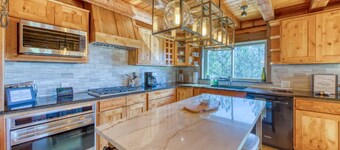 Spacious cabin in the woods w/ a private hot tub, deck, & fireplace  SUV  needed
