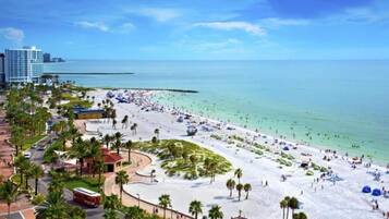Guests can enjoy a beachside stay with access to the sandy beach and scenic views.