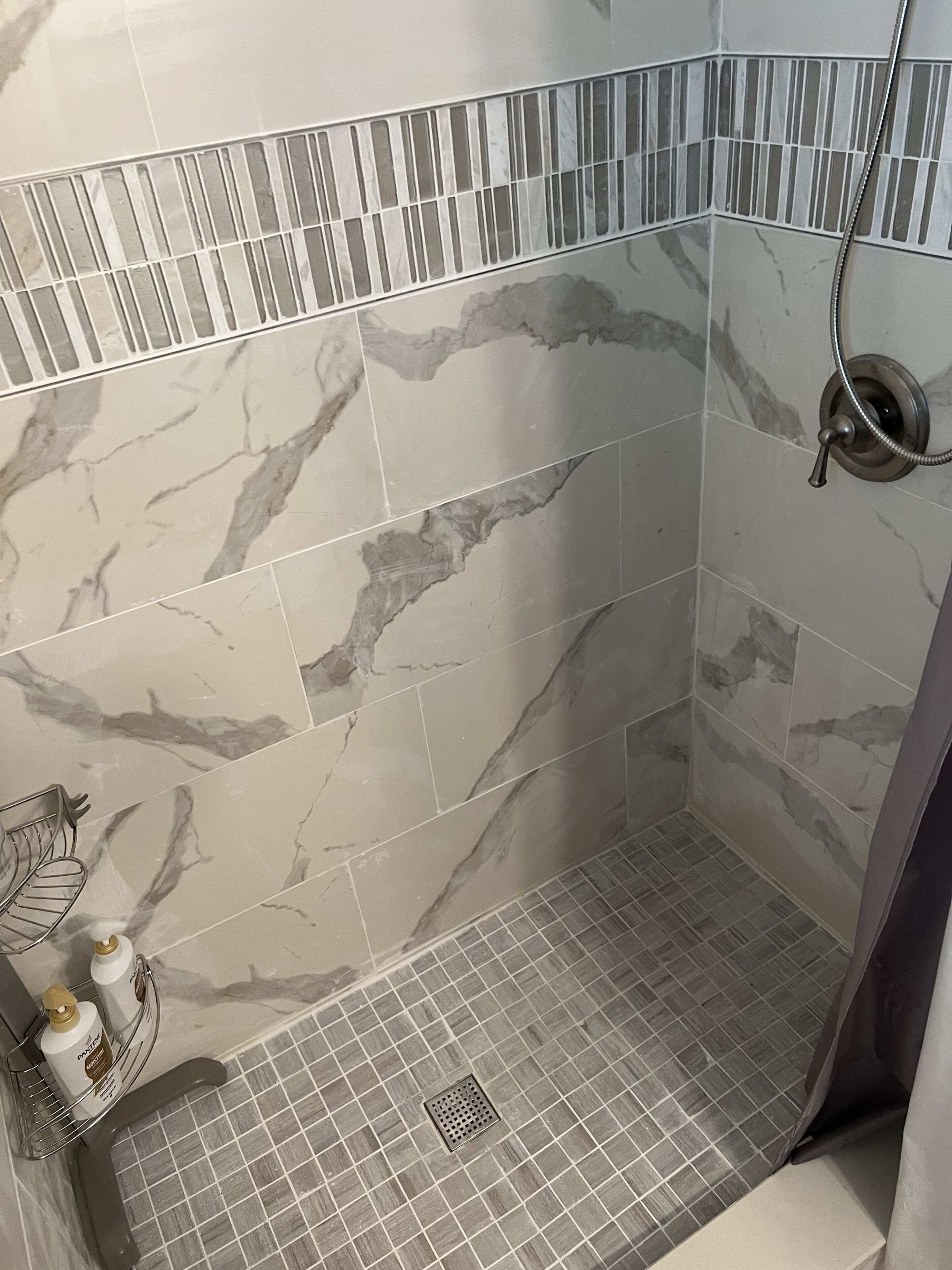 Bathtub, hair dryer, towels, soap
