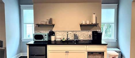 Fridge, microwave, stovetop, coffee/tea maker