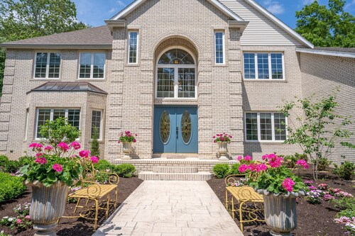 Located in the Heart of the Estate and Steps from the Pool