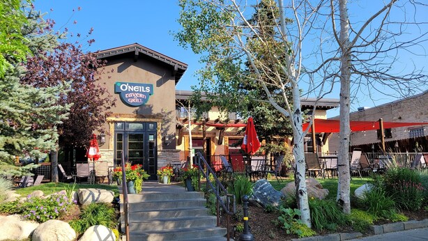 A restaurant with outdoor seating, a stone facade, and a sign reading "Ongels Tavern & Grill". - Downtown Fun! A/C shufflebrd Pacman, Steps Fm SkiBus, DogOK, walk to Yampa River (Steamboat Springs)
